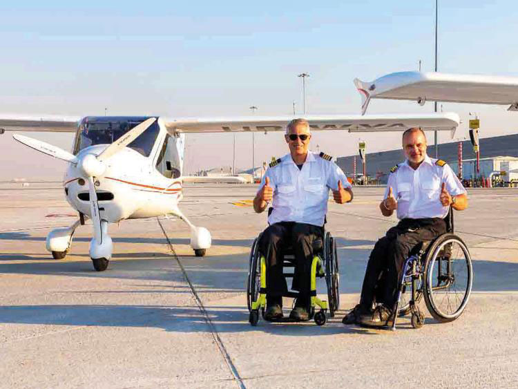 Two pilots in wheelchairs create history in UAE